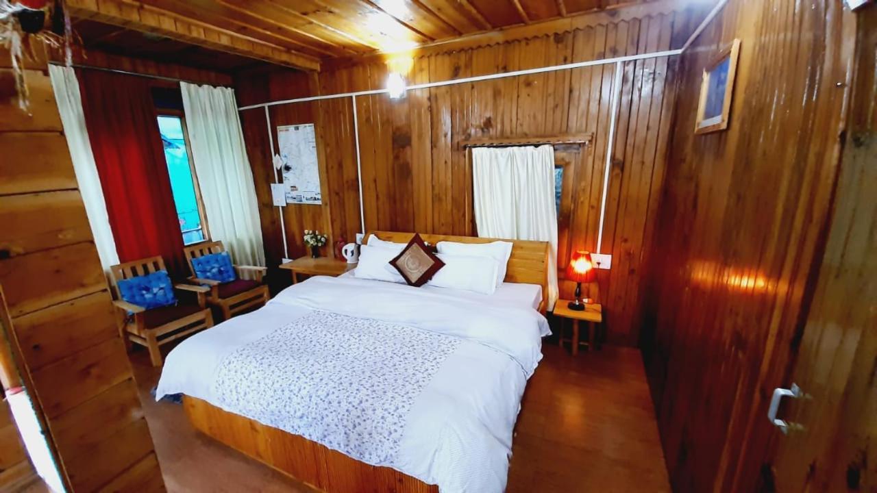 Ishan Log Huts-A Boutique Home Stay Banjār Екстериор снимка