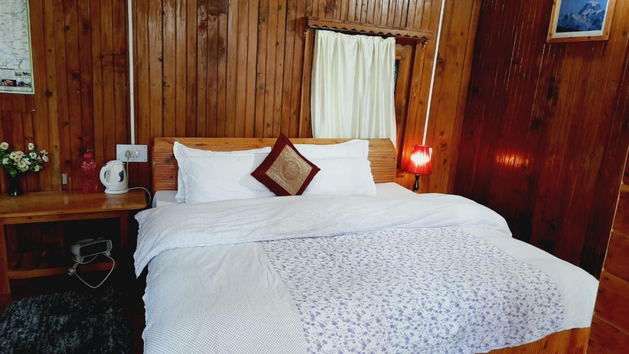 Ishan Log Huts-A Boutique Home Stay Banjār Екстериор снимка